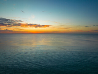 .aerial panorama beautiful sunset at Surin beach Phuket..amazing colorful cloud in beautiful sky at sunset..Scene of Colorful romantic sky sunset with cloud in the sky background..