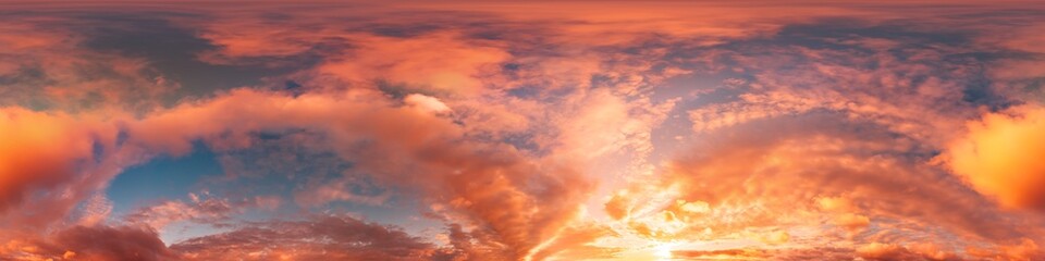 Sunset sky panorama with bright glowing pink Cirrus clouds. HDR 360 seamless spherical panorama....