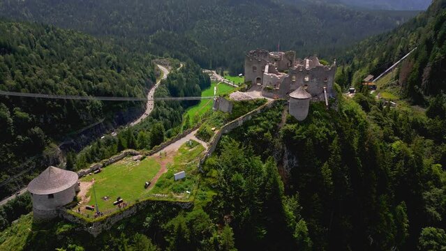 Ehrenberg Castle and suspension bridge on Reutte mountains in Tyrol, Austria. Aerial