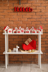 Obraz premium Christmas advent calendar on shelf in room