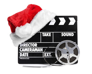 Movie clapper with Santa hat and film reel  on white background