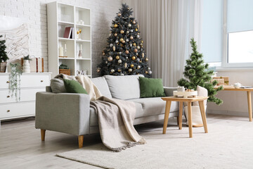 Stylish interior of modern living room with beautiful Christmas trees