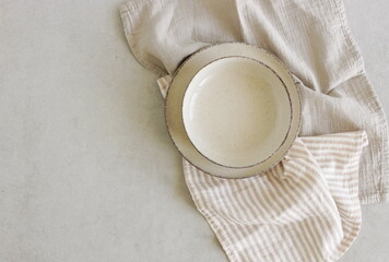 Plates mockup, linen napkins top view with space for text or menu. Empty modern minimal table place setting neutral colors .Business food brand template. Scandinavian style tableware.