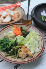 The ingredients for making Indonesian food called lotek are on the table