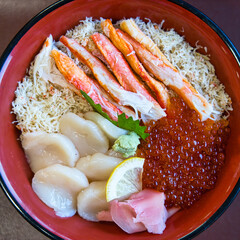 Hokkaido, Japan - November 16, 2023: Closeup of Kaisen donburi or bowl of rice topped with seafood in Hokkaido, Japan