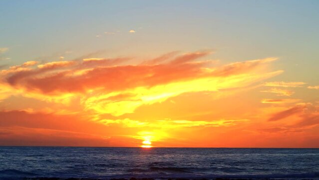 Sunset over sea waves near beach Aerial sunset Paradise island 4K Fast motion
