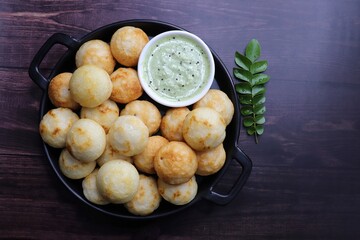 Paniyaram are savory balls made using fermented rice and urad dal batter along with tempered onion...