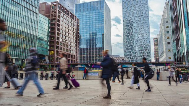 Time lapse of Crowd Commuter business office people walking in rush hour after working at Canary Wharf Station in London, United Kingdom