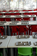 Empty tables in the kindergarten cafeteria