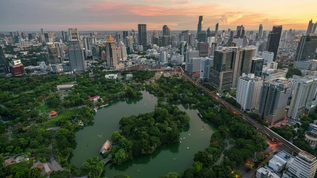 Bangkok cityscape and Lumpini park green space view, day to night, 4k time lapse clip
