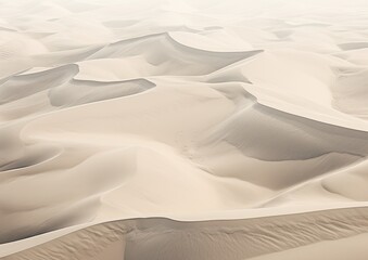 Fototapeta na wymiar A vast desert landscape with sand dunes stretching towards the horizon, captured from a high