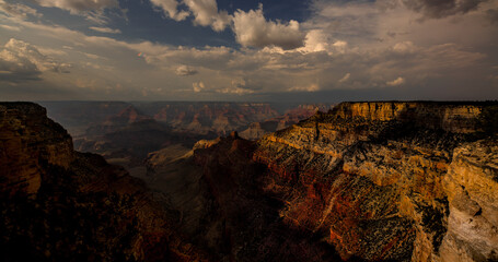 Grand Canyon National Park drenched with the richest desert colors and late-day clearing storm clouds.