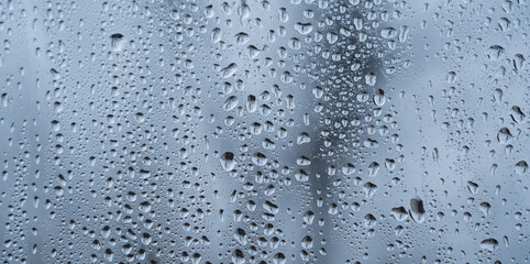 Water drops. Rain on the clear glass window. 