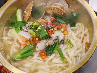 Korean food. Seafood kalguksu. Korean traditional noodle soup
