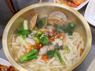 Korean food. Seafood kalguksu. Korean traditional noodle soup