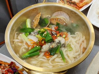 Korean food. Seafood kalguksu. Korean traditional noodle soup