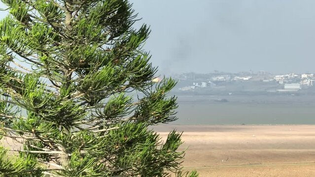 Gaza at war burning buildings, aerial view, 2023
Drone view of Gaza at war with israel, December,14,2023 
