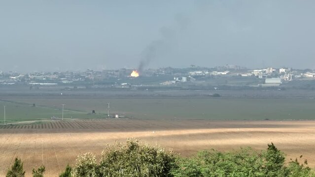 Gaza and Israel in war burning buildings, aerial view, 2023
Drone view of Gaza at war with Israel, December,14,2023 
