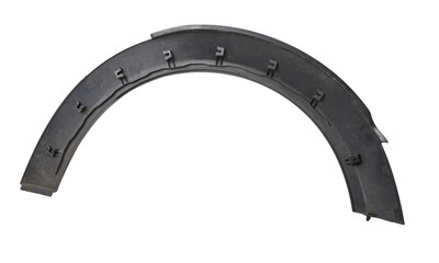 Black plastic fender flare on a white isolated background in a photo studio for sale or replacement...
