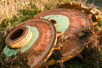 Old tractor wheels paddy rice combine harvester