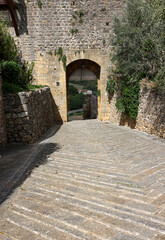 Obraz premium Porta Fiorentina city gate in Monteriggioni medieval walled town near Siena in Tuscany, Italy