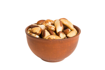 Roasted Brazil nut in bowl isolated on white background. Brazil nut is snack or raw of cook. Healthy food concept