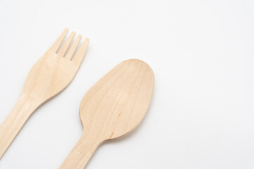Wooden Cutlery, Eco Tableware, Disposable Cutlery, Recycle. Eco food packaging concept, zero waste paper, sustainability.