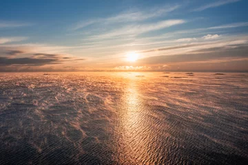 Fototapeten sunset over the sea © Artem