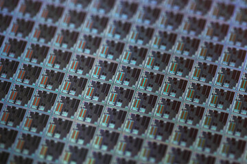 Macro Shot of a Silicon Wafer with Computer Chips during Manufacturing Process at Fab or Foundry....