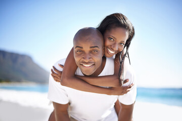 Happy, piggyback and portrait of black couple at beach for valentines day vacation, holiday or...