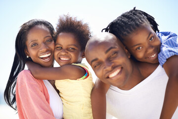 Portrait, piggyback and a black family on the beach in summer together for travel, freedom or...