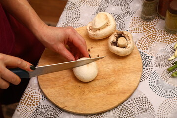 Mushrooms on wooden cutting board