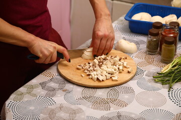 Mushrooms on wooden cutting board