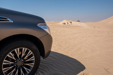 SUV four wheel drive vehicle car Al Qudra empty quarter seamless desert sahara in Dubai UAE middle...