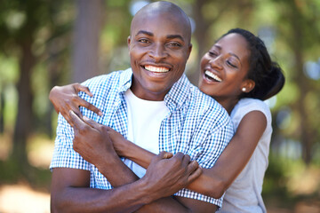 Hug, portrait or happy black couple in forest to relax or bond on holiday vacation together in...