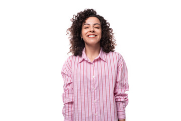 young successful caucasian leader woman in pink striped shirt on background with copy space