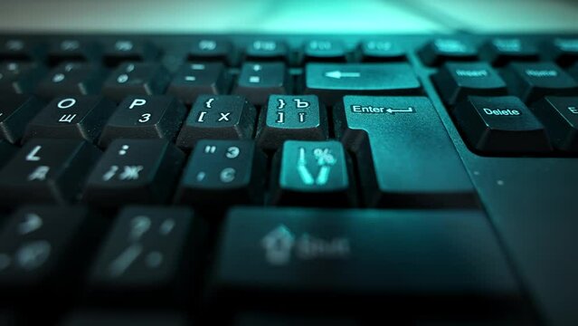 close-up of a finger pressing the "Enter" key on a keyboard
close-up of male hands typing on a black keyboard
Focused and determined, man types search query, diving into the vast sea of the Internet