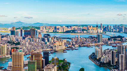 Aerial view of Macau city skyline and modern buildings scenery at sunset. Famous travel destination.