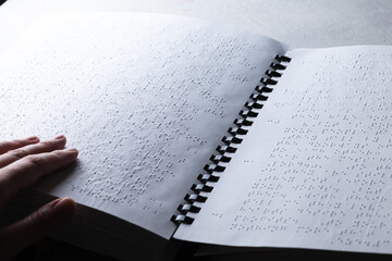 Reading a book in Braille