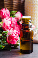 Small bottle with essential oil. Aromatherapy and herbal medicine concept.