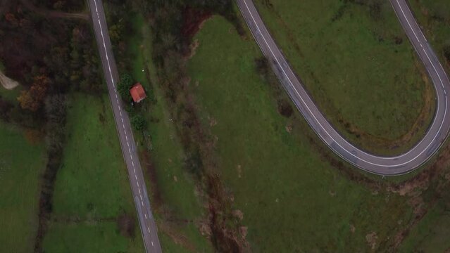 Aerial view of the road towards Alto del Caracol, in the Pasiegos valleys of Cantabria.