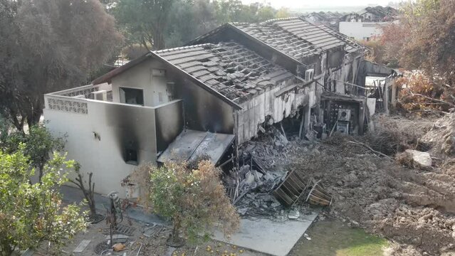 kibbutz Beeri burnt house after attack from Gaza, Aerial
The kibbutz of Bari was attacked by the Hamas terrorist organization on October 7th, drone view, December,2023
