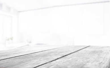 empty wooden table on background of abstract blur white interior, montage, product display, inside and window.
