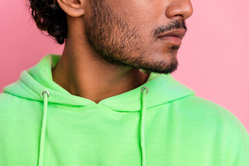 Close up cropped half face photo of hipster guy in green hoodie bristle with minded expression look...