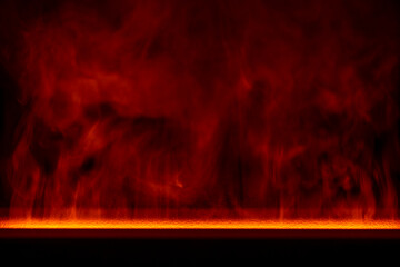 Water red vapor from the humidifier on a black background, closeup. Abstract flowing steam smoke with from the humidifier