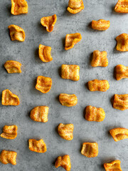 Background of chips on gray background. Top view.