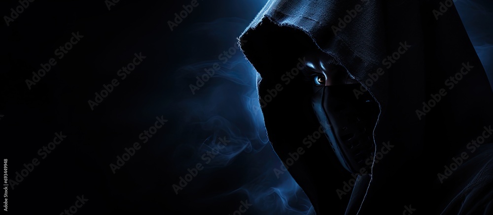 Poster Hooded figure with hidden code lurking in shadows.