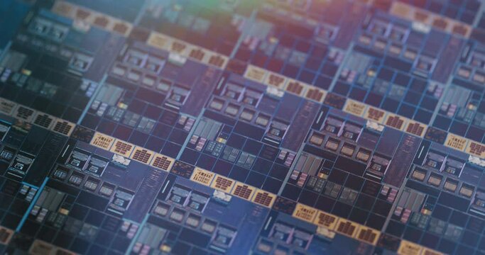 Macro Shot of a Silicon Wafer with Computer Chips during Manufacturing Process at Fab or Foundry. Semicondutor Wafer Texture.