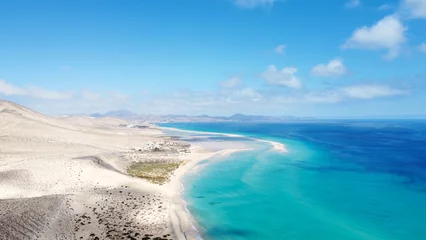 Foto auf Acrylglas Strand Sotavento, Fuerteventura, Kanarische Inseln Aerial drone shot from Canary islands. Sotavento beach on the coast of Fuerteventura island. Natural sunny light. Blue sky and dunes. Coastline.