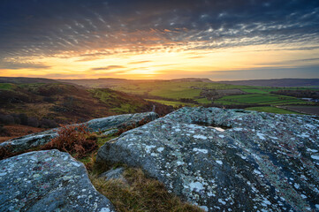 Sunset at Corby's Crags, which look over the Vale of Whittingham towards the Cheviot Hills at...